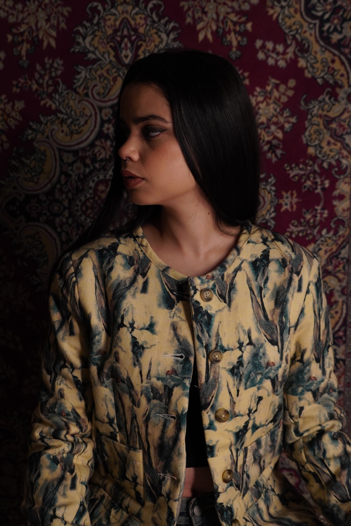 This piece of clothing has been referred to on the Bee as the “Noor women’s
multicolored fleece wool quilted jacket with warm quilting.” A fashionable fleece quilted
wool coat in a shocking colorful panels for women