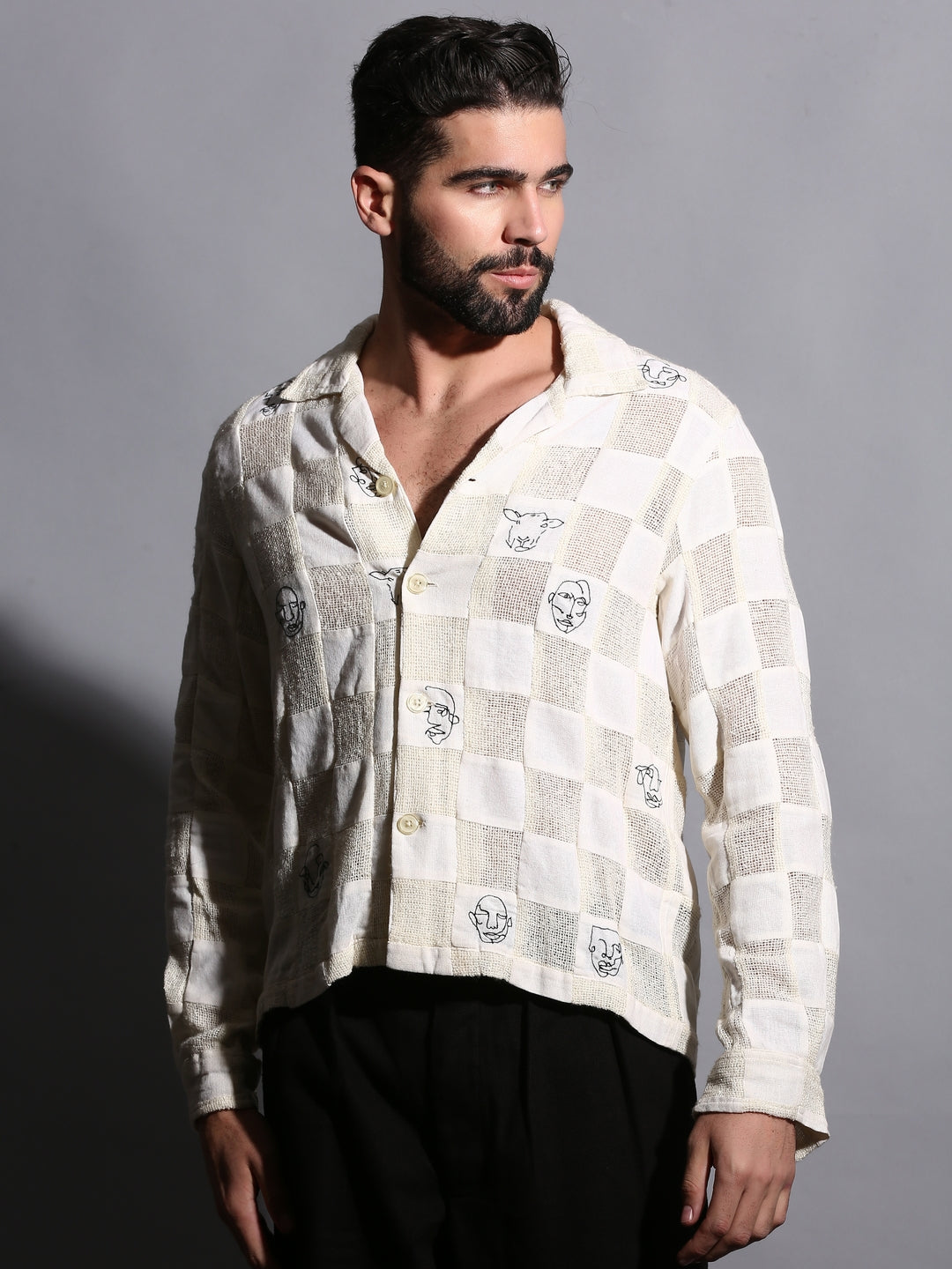 “Artistic face pattern on patchwork cotton shirt in beige