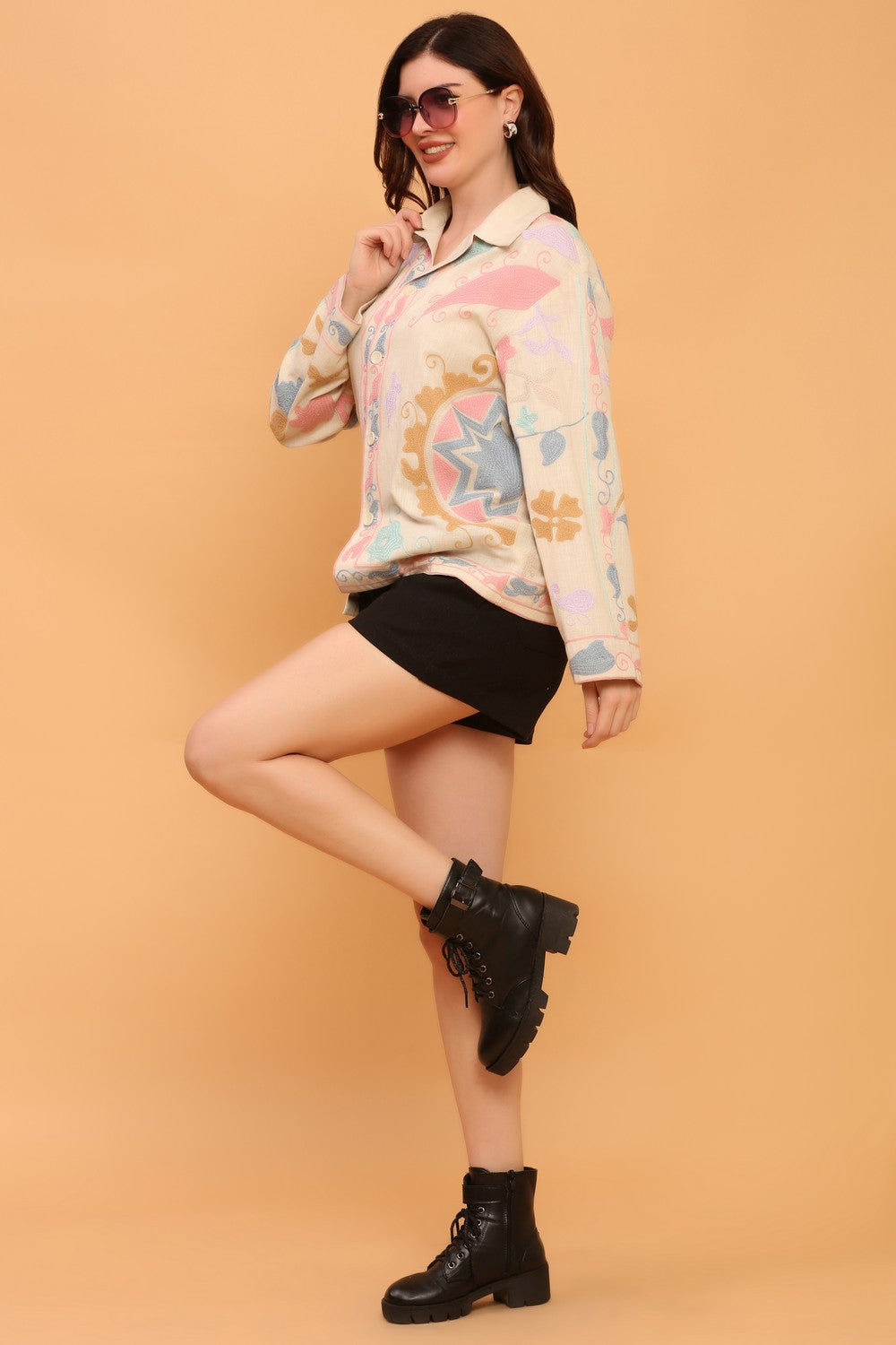 “All-over Suzani embroidery and chain stitches on a unisex organic cotton shirt”