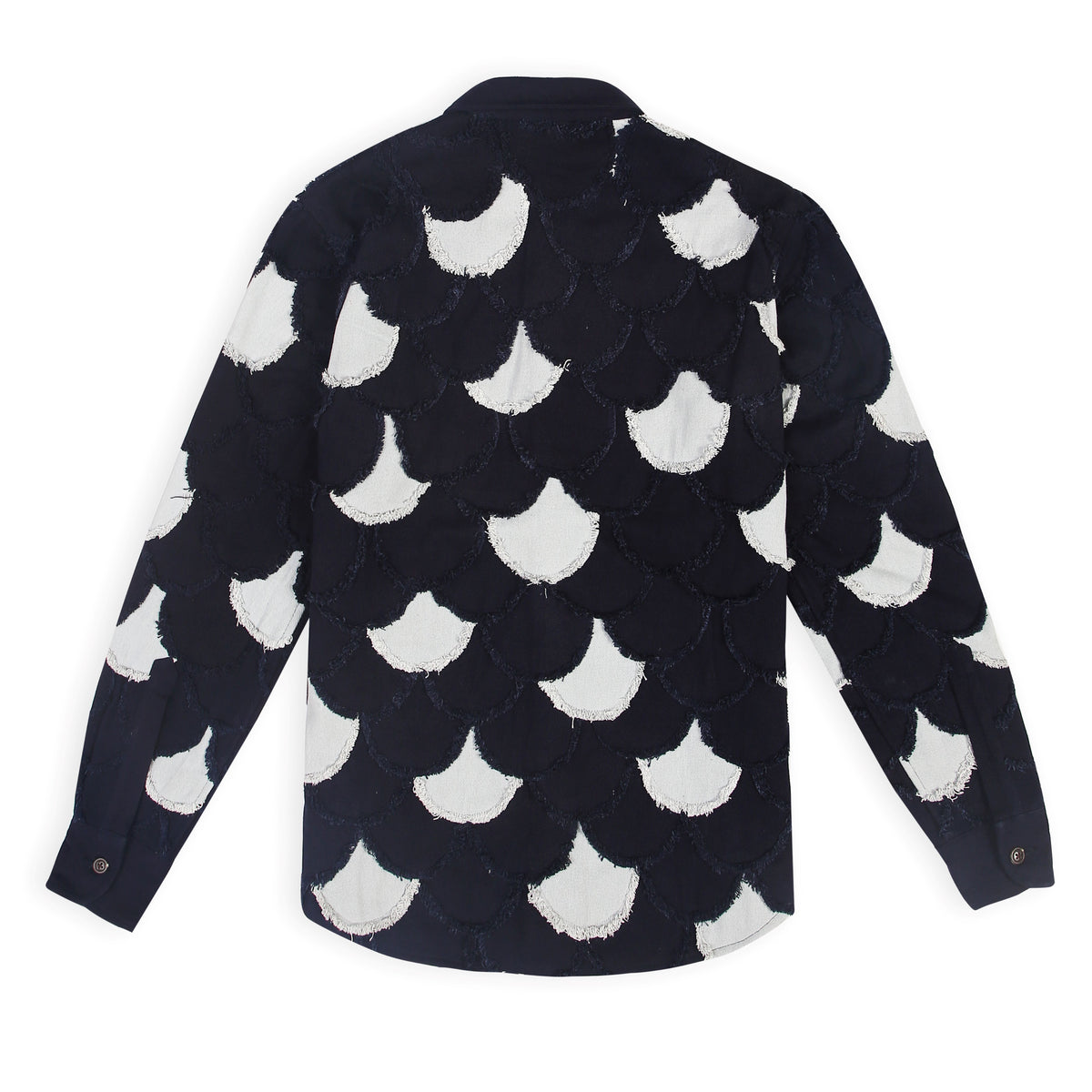 A picture of the Arden Unisex Denim Jacket with eyelash fringe from the front. It reads, 
"Unisex denim jacket with patchwork design and handmade eyelash fringe" and "Arden 
denim jacket in light blue and navy with fringe details."