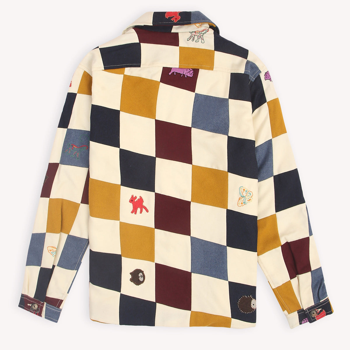 Jackson gender-fluid multicolor patchwork wool shacket with appliqué embroidery 
“Chic unisex patchwork embroidered wool jacket in multicolor panels” 