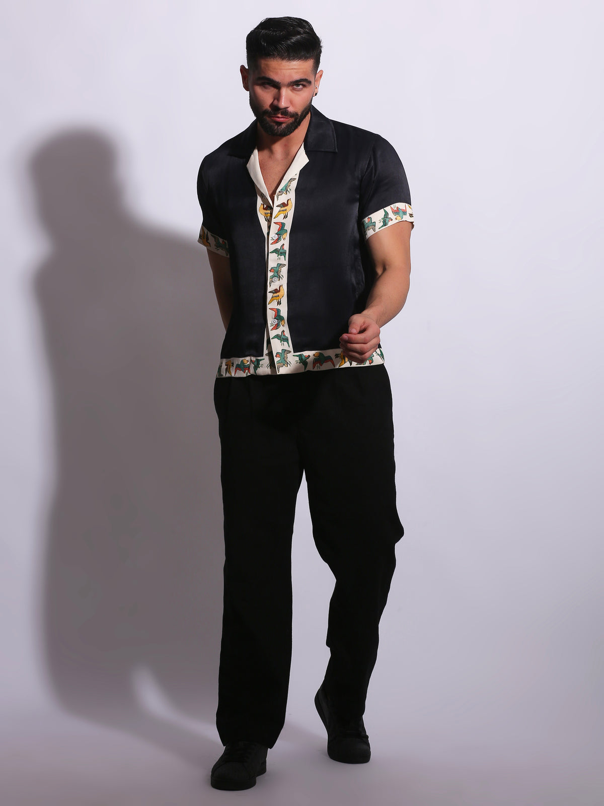 The BIRD OF PARADISE SHIRT is designed to bring a sense of movement and individuality through carefully placed print detailing.
