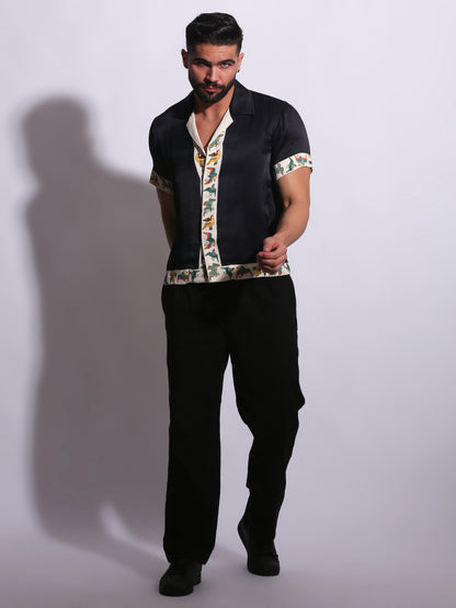 The BIRD OF PARADISE SHIRT is designed to bring a sense of movement and individuality through carefully placed print detailing.