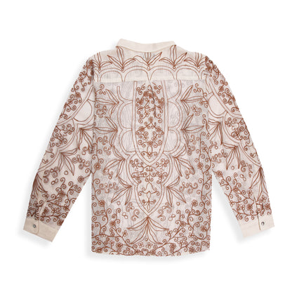 A beige long-sleeved shirt with intricate brown floral embroidery