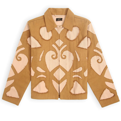 A beige unisex jacket with intricate cutwork patterns on the front, featuring a pointed collar and front hook closures.
