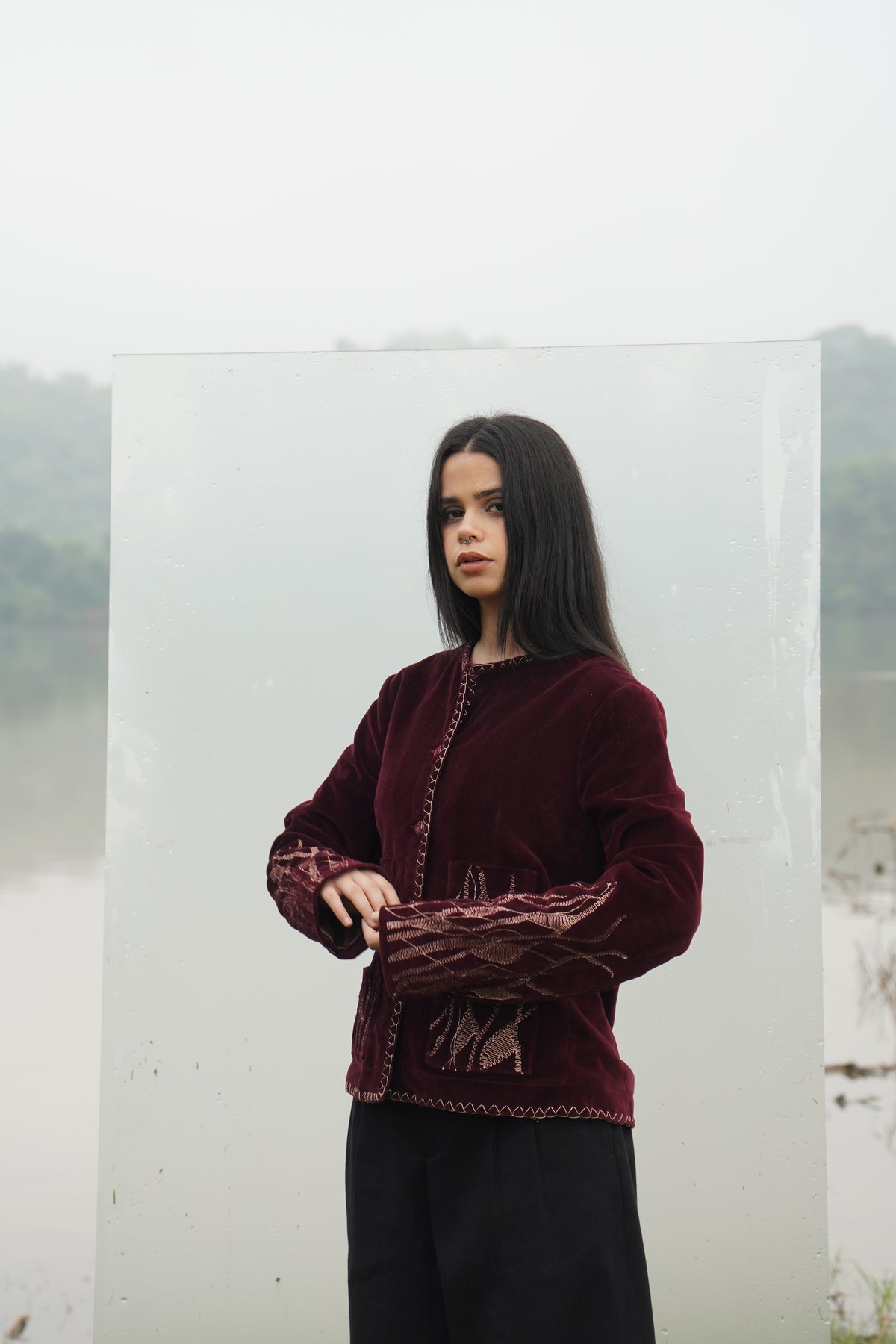 “Kiara women’s embroidered suede jacket with zari work in burgundy” 
"Women Burgundy Suede Jacket with Zari Work Detailed and Hand Stitched"