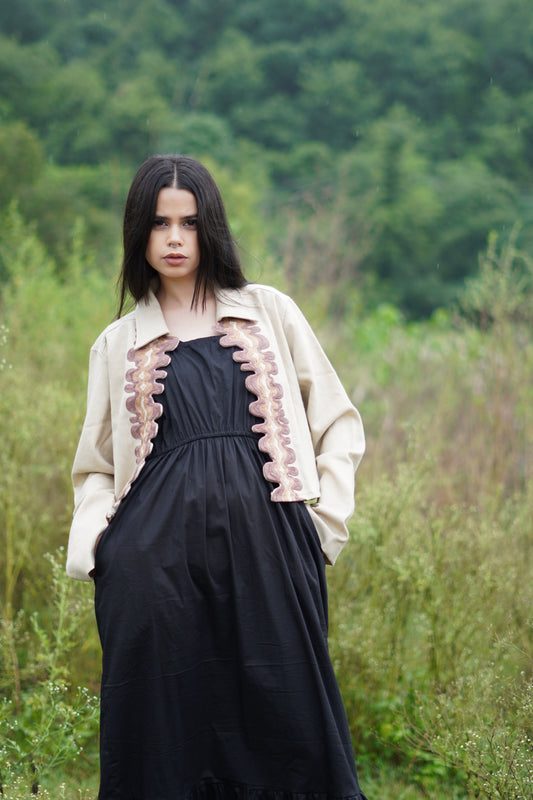 “Women’s beige coloured coat with cording work embroidery in merino wool”