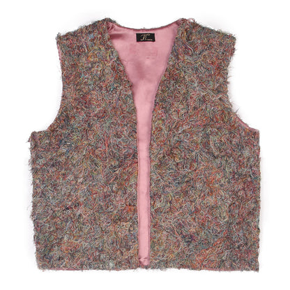 A multicolored, textured unisex jacket with a pink zipper and a visible brand tag on the top left.