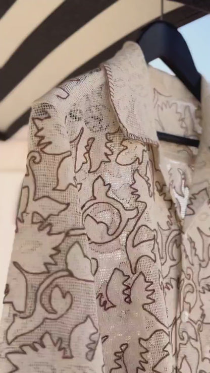 “Beige embroidered textured weave shirt with intricate chain stitch work” 