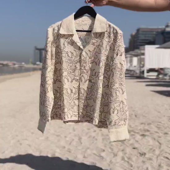 “Beige embroidered textured weave shirt with intricate chain stitch work” 