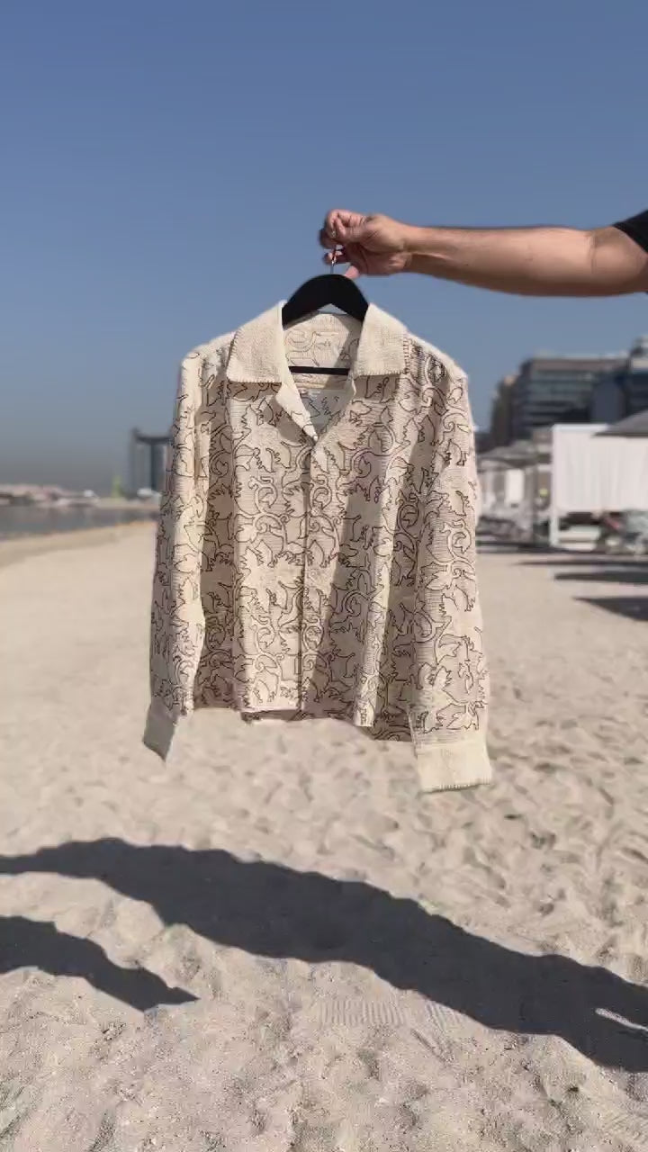 “Beige embroidered textured weave shirt with intricate chain stitch work” 