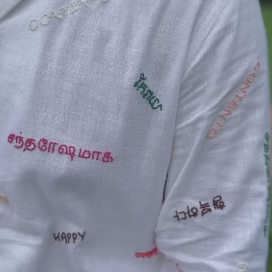 “Premium white linen shirt with embroidered details”