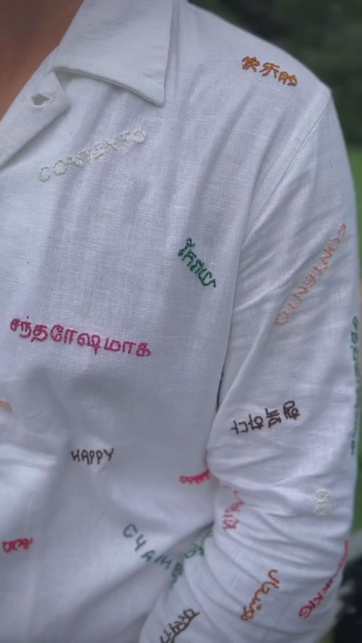 “Premium white linen shirt with embroidered details”